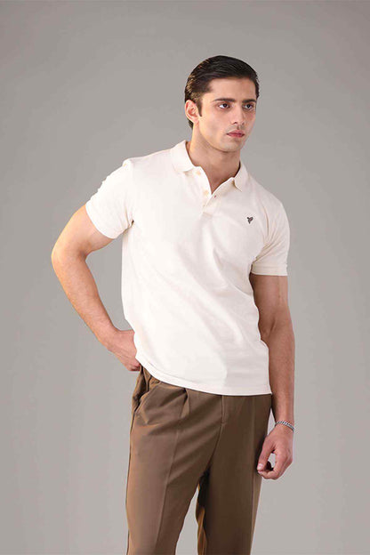 Fitted white polo shirt side-lean view with collar, button placket, and logo