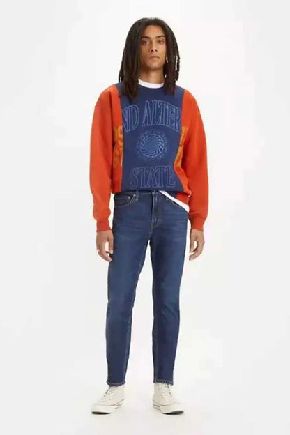 Levi's dark indigo denim jeans, straight-leg silhouette with mid-rise waistband