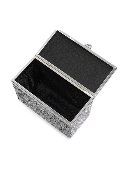 Silver glitter handbag open to reveal black lined interior and clasp