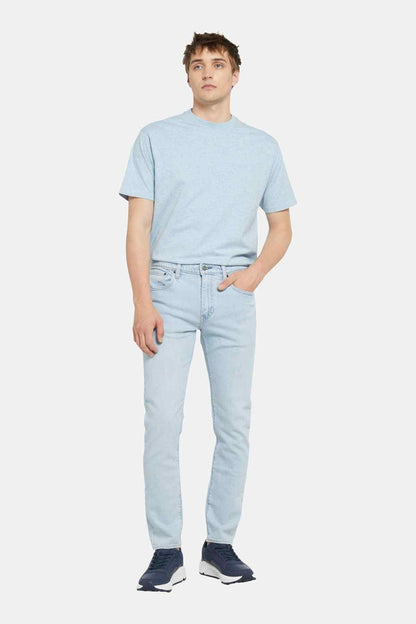 Levi's light blue jeans, front view with button-fly and front pockets