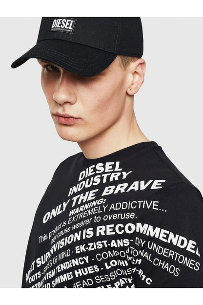 Black graphic T-shirt close-up, white lettering around chest and shoulders