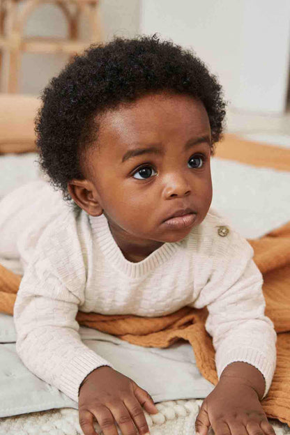 Baby knit sweater and pants, light pink textured with shoulder buttons