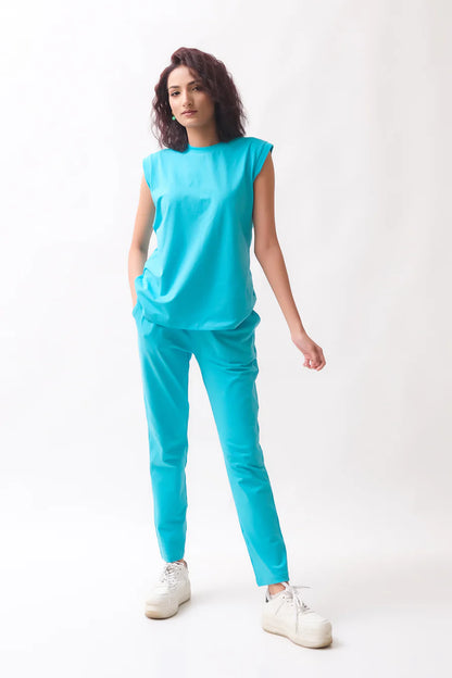 Turquoise sleeveless tunic with matching tapered jogger pants set for women