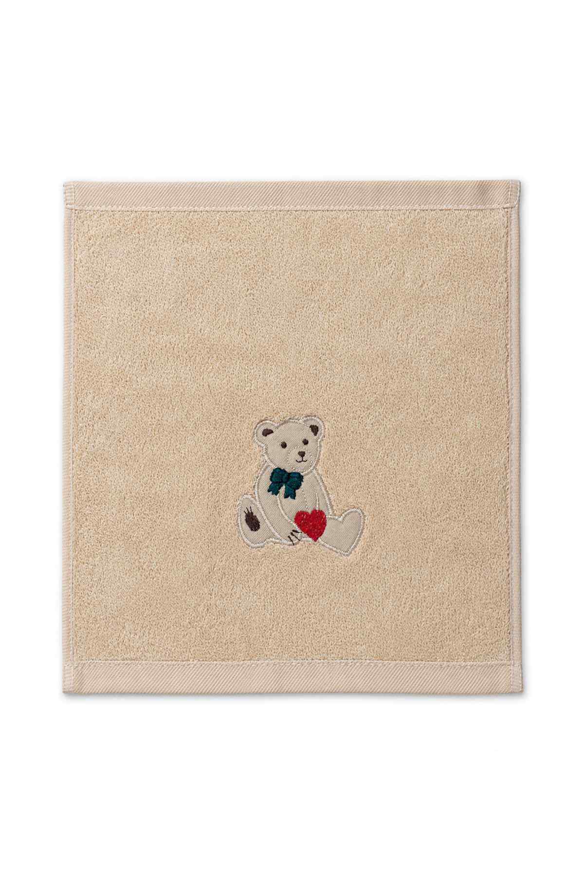 Baby washcloth square in light tan with centered teddy bear and red heart