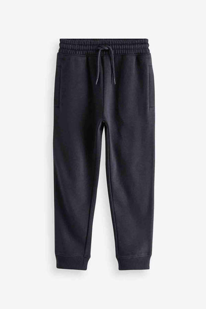Dark navy jogger sweatpants with elastic waistband and drawstring, tapered cuffs