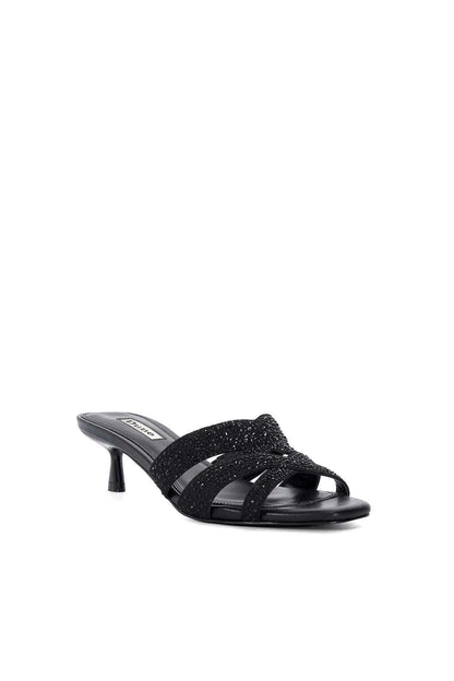 Black mule sandals with rhinestone crisscross straps and slim block heel