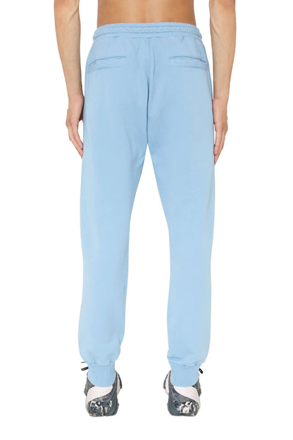 Light blue jogger pants, back view with elastic waistband and stitched panels