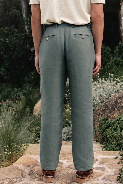 Men's green suit trousers with front pleats and straight fit