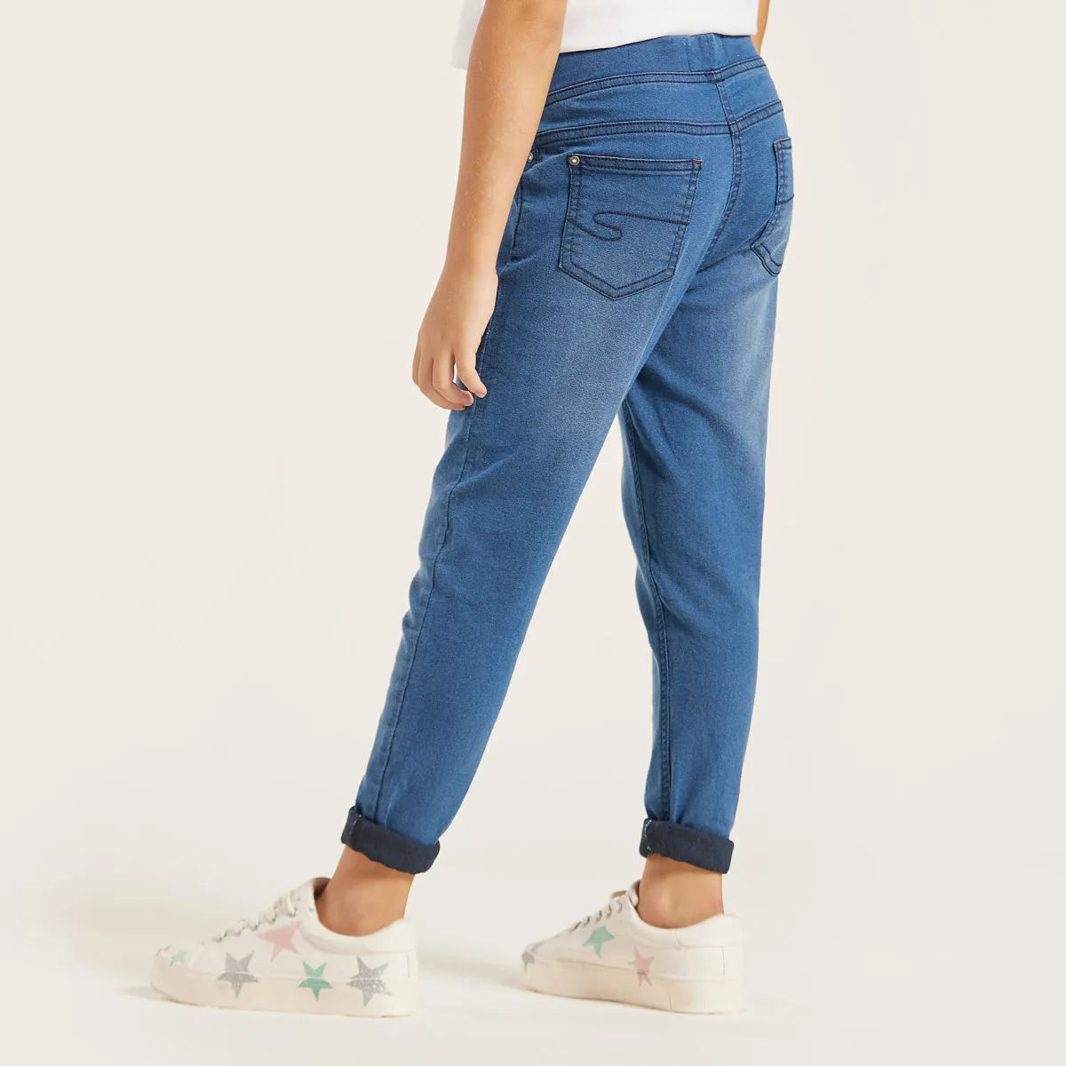 Blue denim baby jeans with back patch pocket and cuffed hems