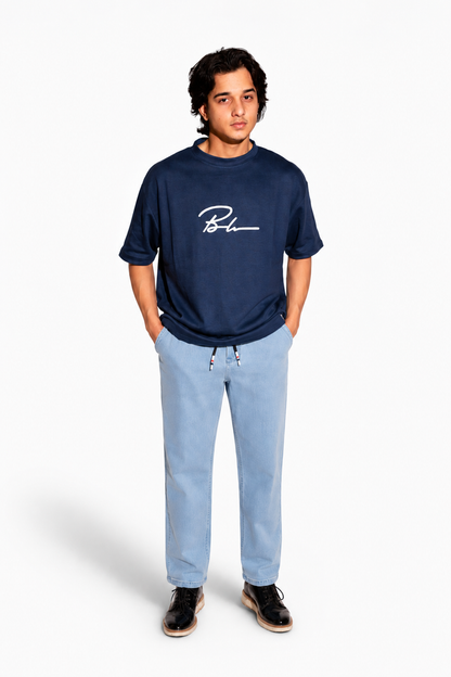 Beleri London Ice Blue drawstring jeans, light denim, front pockets, worn with sneakers