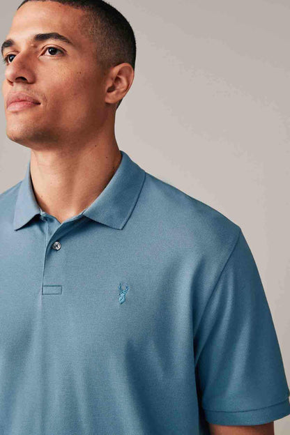 Light blue polo shirt close-up with button placket, collar, small chest emblem