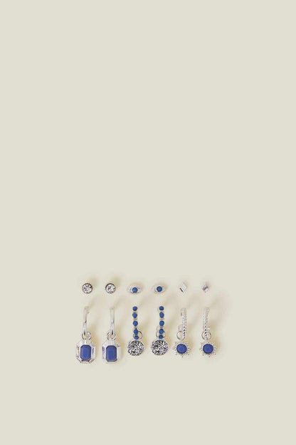 Assorted silver-tone earrings with blue and clear stones, stud and drop styles.
