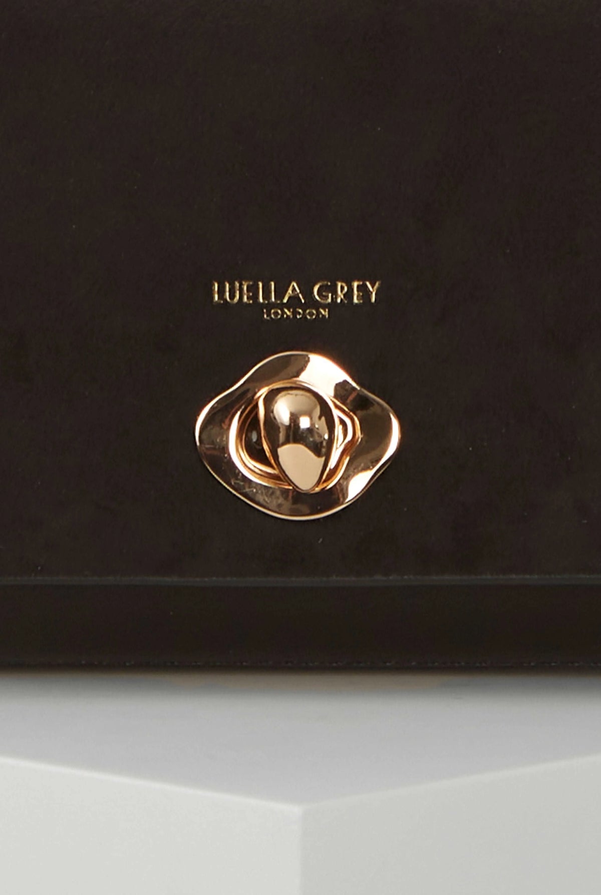 Gold-tone Luella Grey logo clasp on black flap shoulder handbag