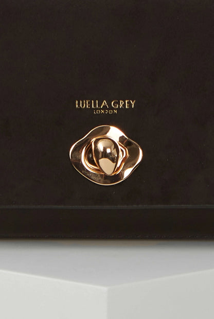 Gold-tone Luella Grey logo clasp on black flap shoulder handbag