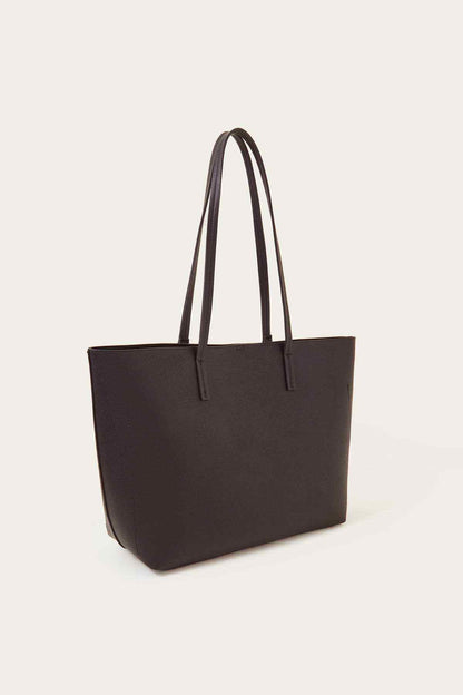 Black tote bag with long handles and a flat, structured base.