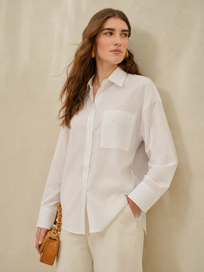 White pinstripe button-up shirt with breast pocket and long sleeves