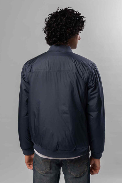 Men's Levi's navy-blue jacket from back view, full zip and ribbed hem