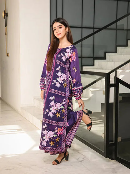 Purple floral maxi dress, three-quarter view, long sleeves, round neckline, patterned trim