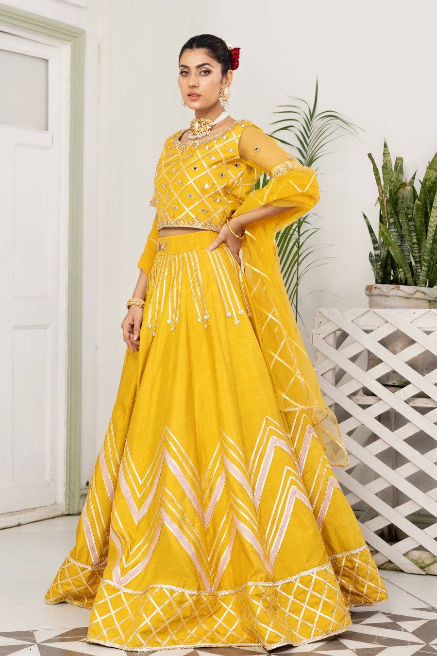 Mustard yellow embroidered maxi dress with chevron hem and sheer puff sleeves
