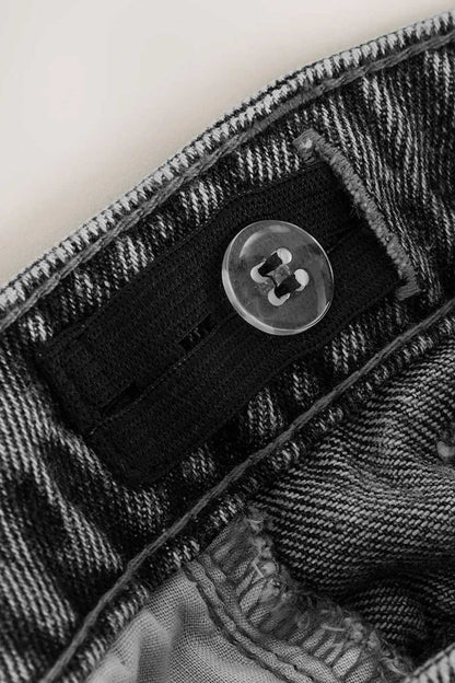 NEXT grey denim shorts close-up of belt loop and buttoned waistband