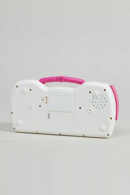 White and pink electronic keyboard toy back panel with speaker holes