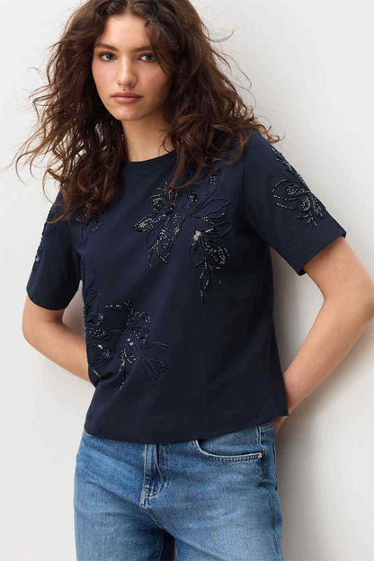 Navy short-sleeve top with embroidered bows and floral embellishment