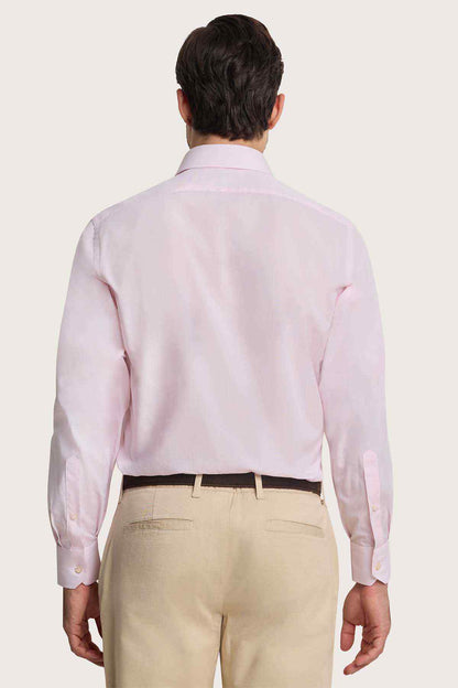 Pink dress shirt back view with yoke and long buttoned sleeves