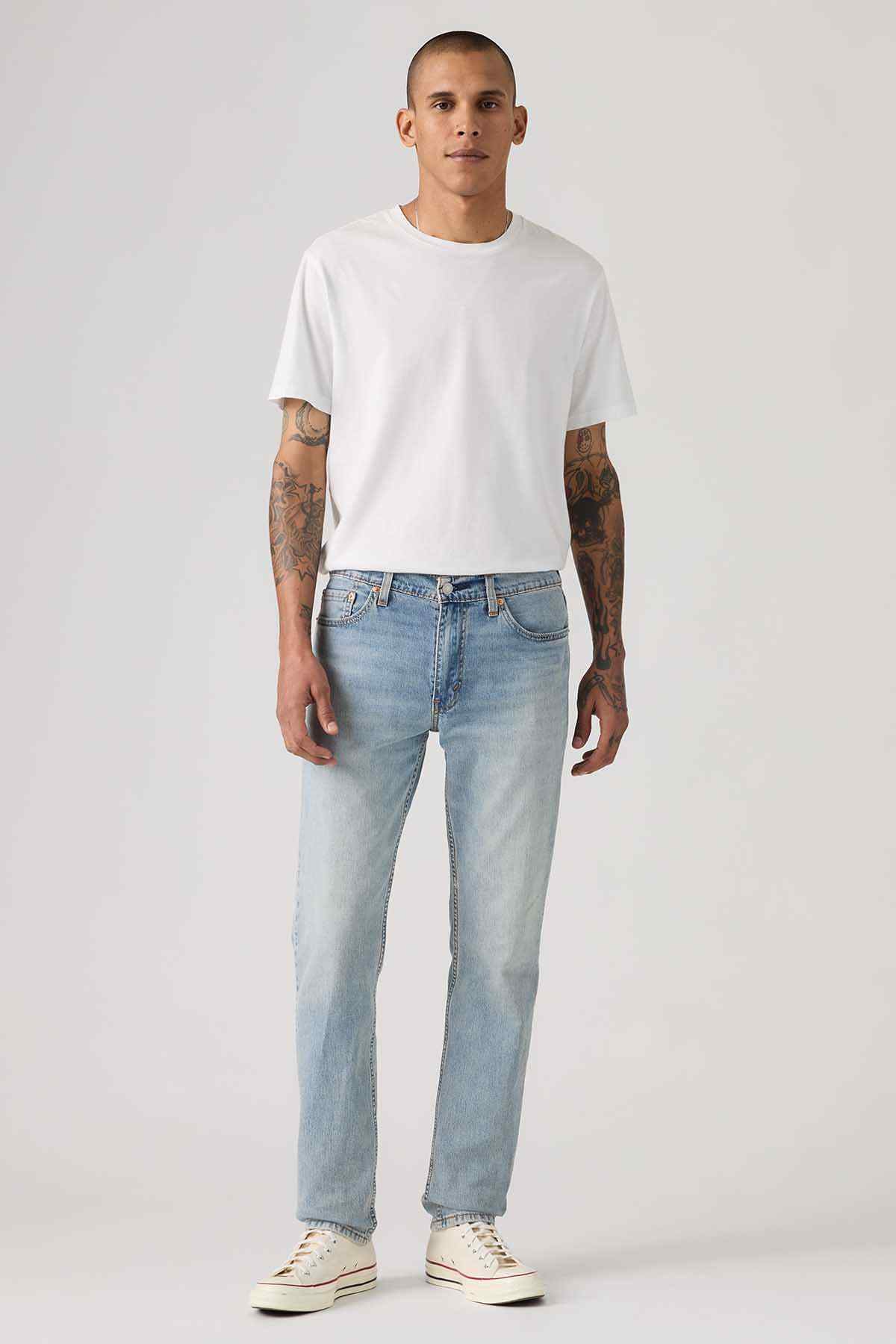 Levi's light-wash denim jeans with front pockets, full-body view