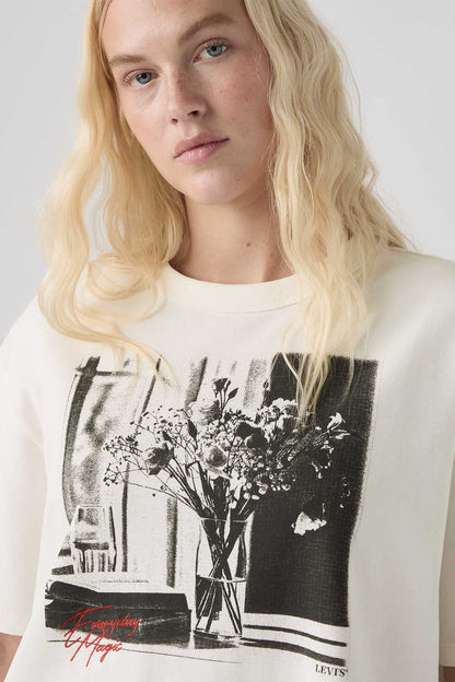 White crew-neck T-shirt with large front black floral photo graphic and red script