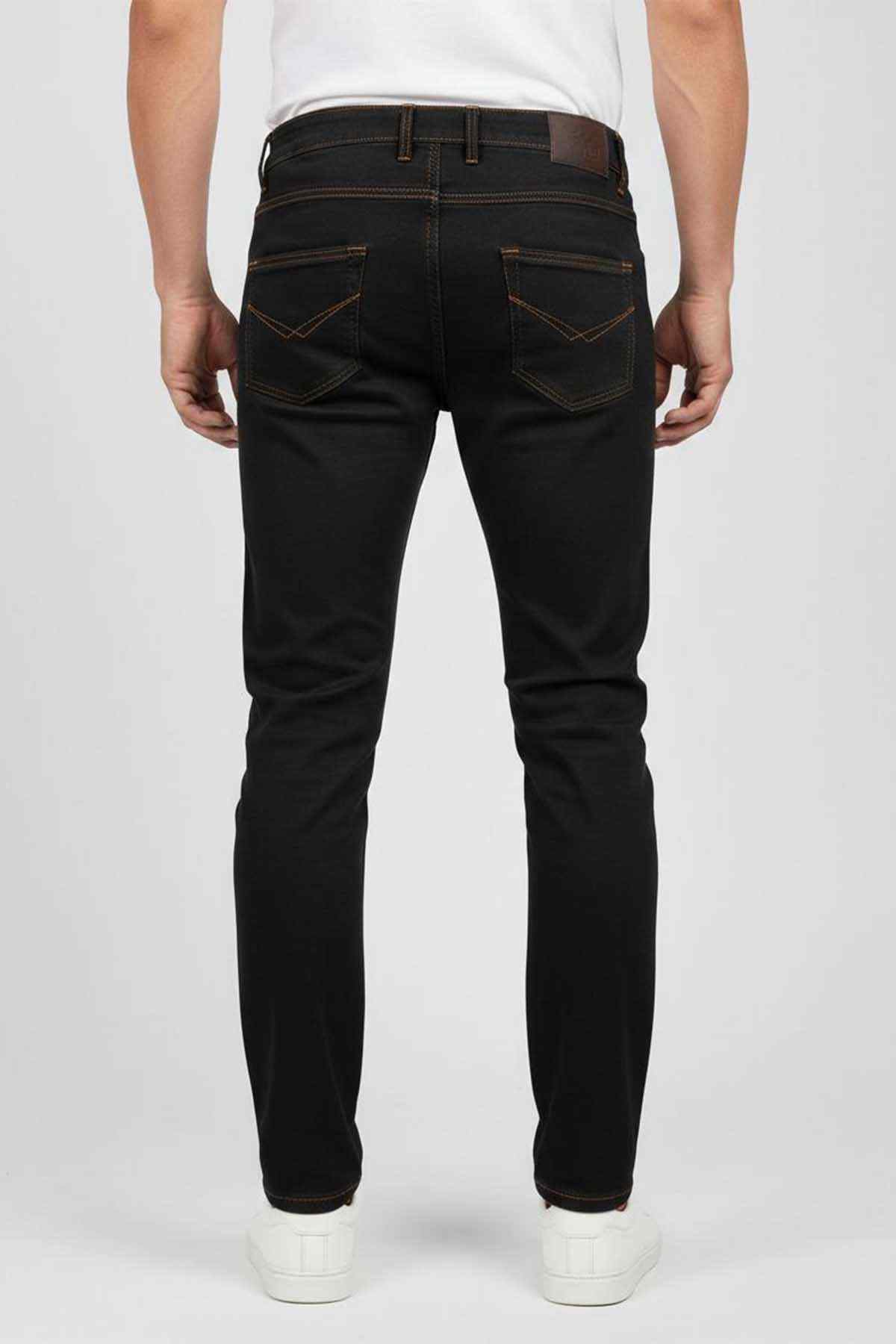 Jet black jeans back view with contrast stitching, belt loops, and two rear pockets