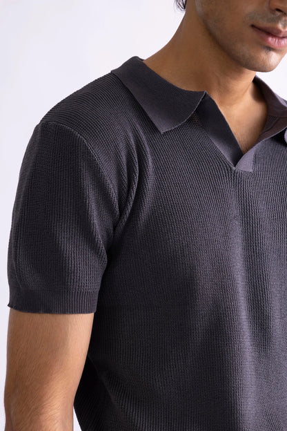 Dark gray knit polo collar and upper sleeve, buttoned placket detail