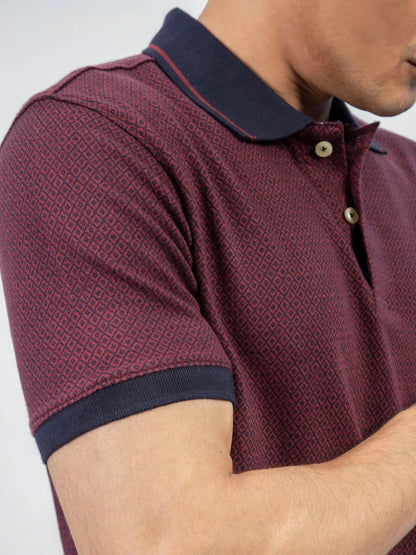Maroon patterned cotton polo shirt with navy collar and button placket