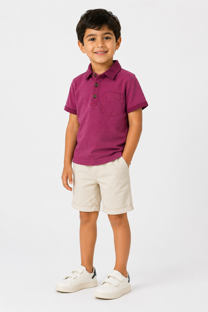 Kids magenta polo shirt with short sleeves, button front, and chest pocket