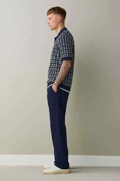 Navy straight-leg trousers side view with belt loops and button closure
