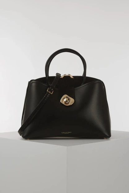 Black structured handbag with top handles and gold-tone front turn-lock clasp