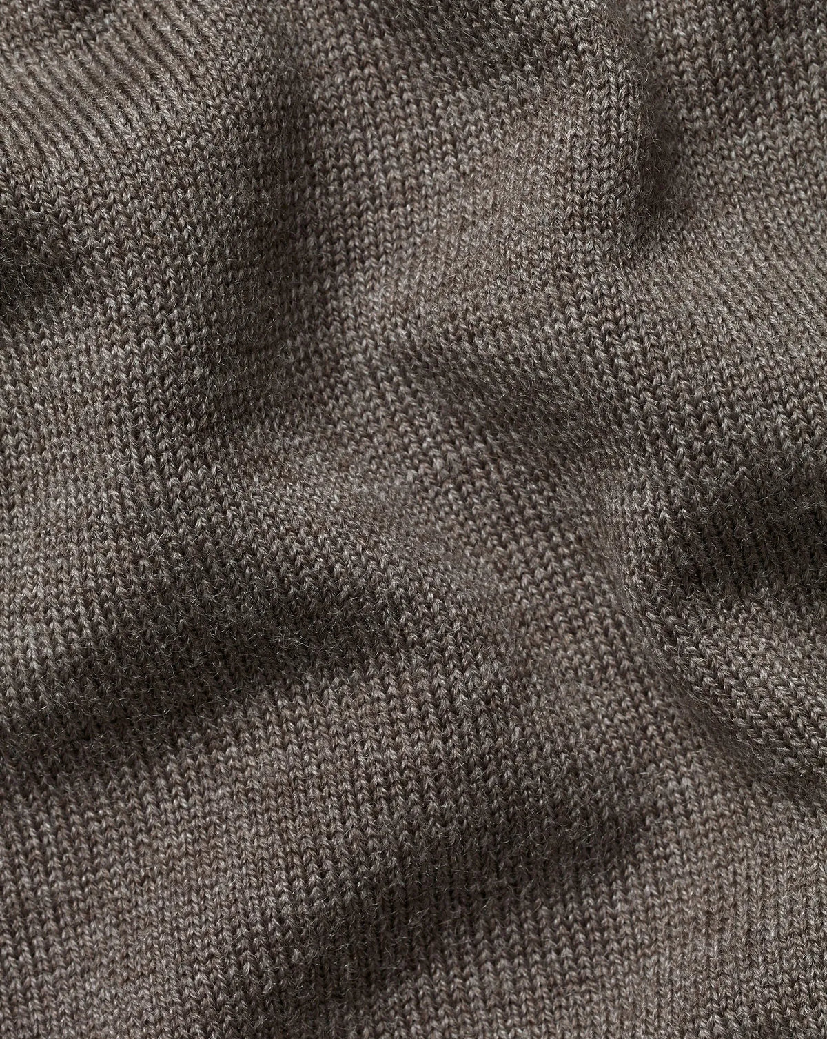 Men's brown knit texture sweater fabric close-up