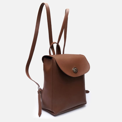 Brown leather mini backpack with front flap clasp and two shoulder straps; small pull tab.
