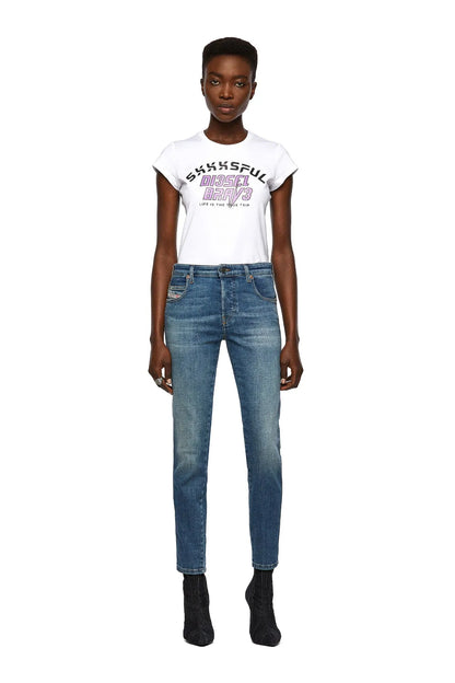 Light blue denim jeans on model; straight fit with five-pocket styling