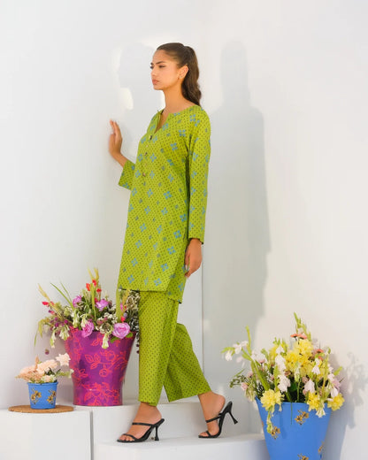 Green patterned kurta and pants set, side profile view; long sleeves and matching trousers