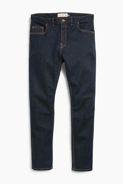 Pair of dark navy raw denim jeans with five-pocket styling and stitched seams