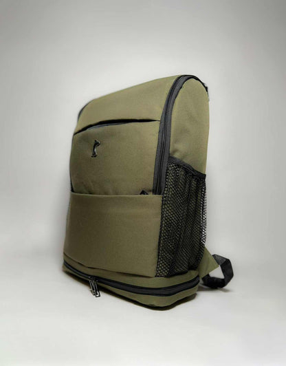 Olive mini backpack with black piping, top handle and side mesh storage pocket