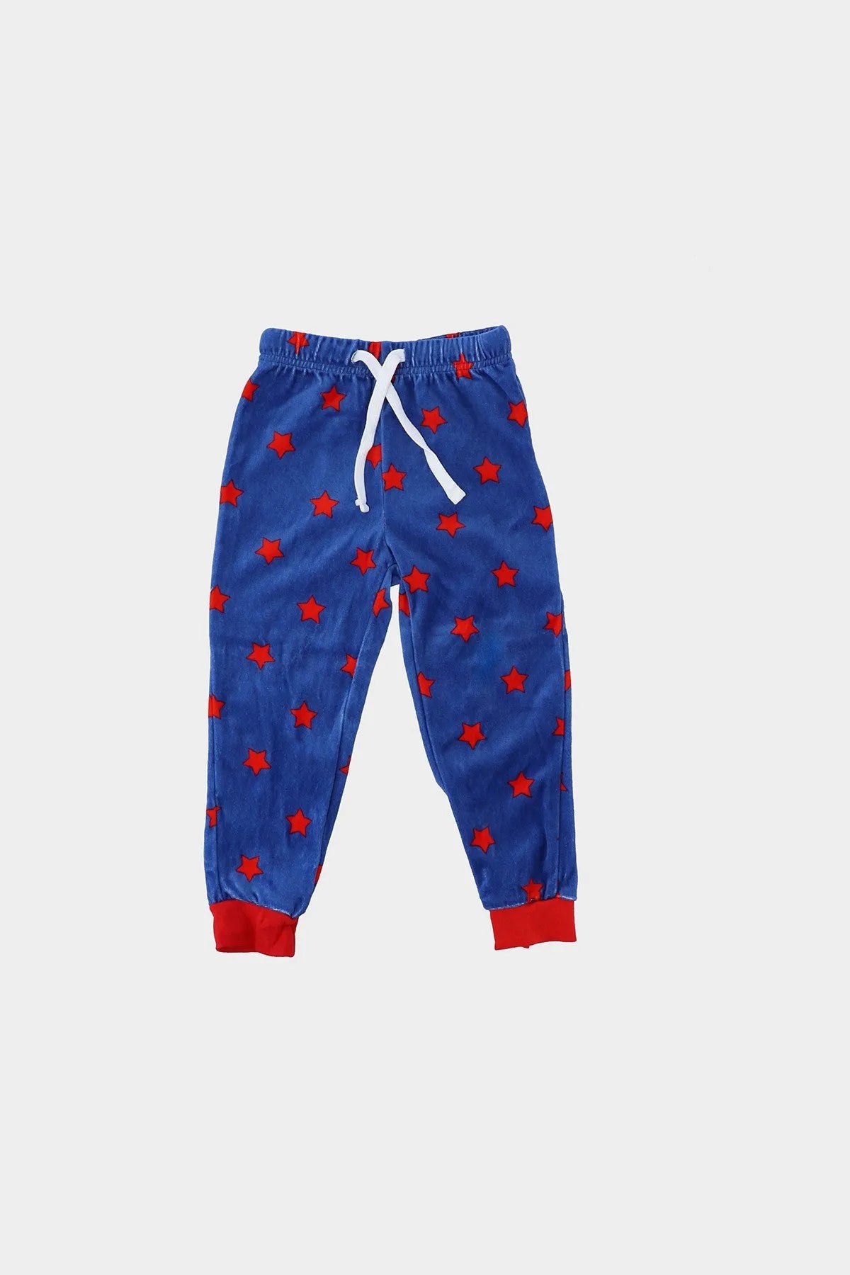 Blue baby pajama pants with red and blue star pattern and elastic waistband