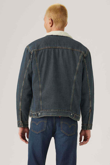 Levi's dark indigo denim jacket, back view with sherpa-lined collar