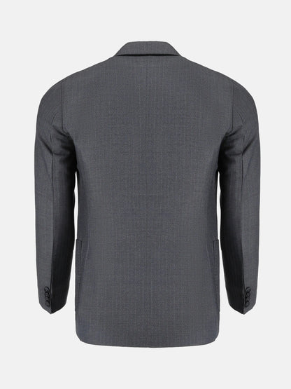 Grey blazer back view with center seam and vented sleeves