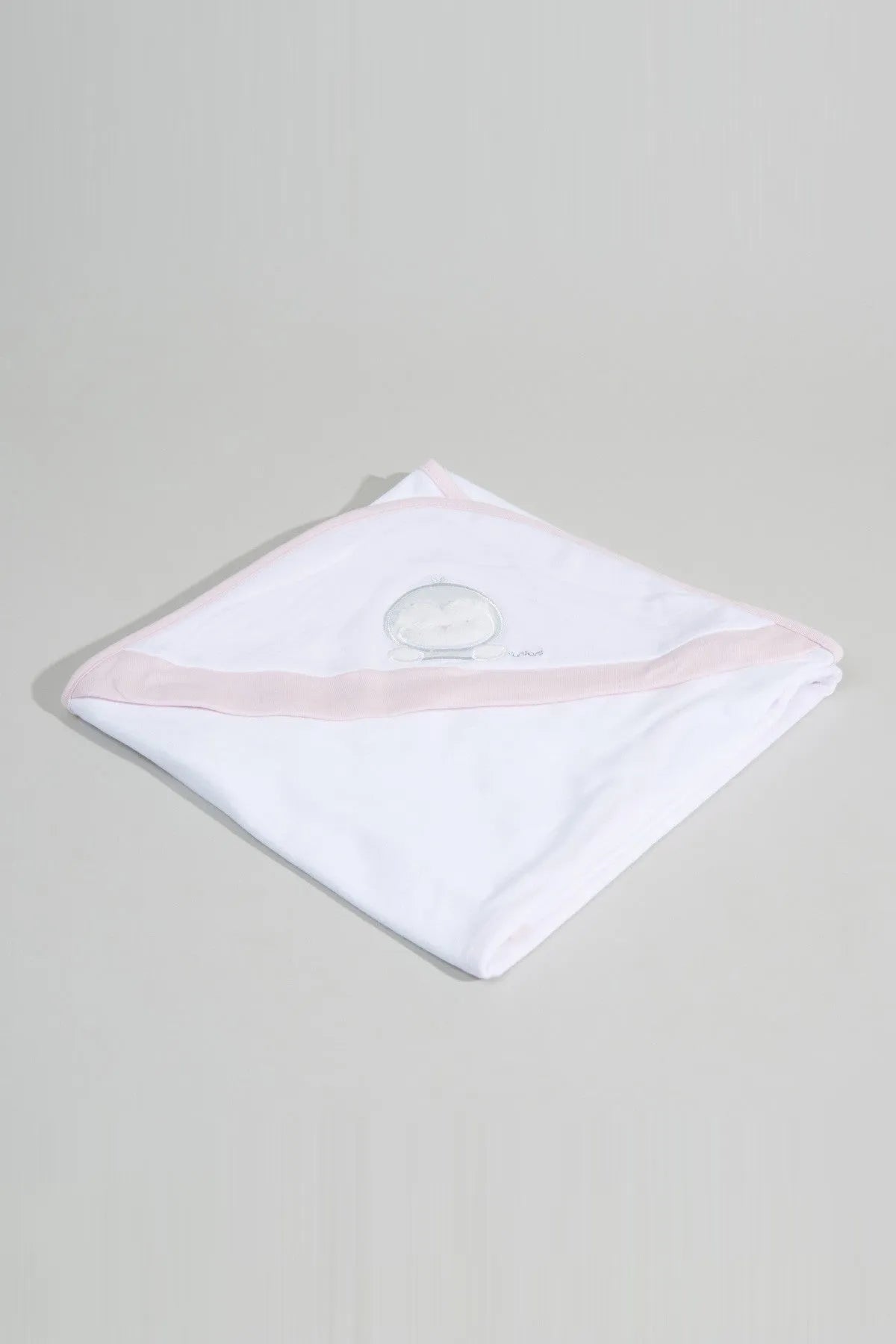 White baby hooded towel, pink edge trim, round applique detail