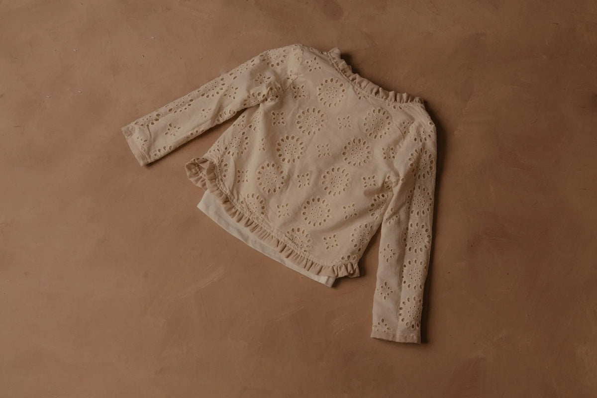 Licci beige eyelet long-sleeve top with elastic cuffs and ruffle hem