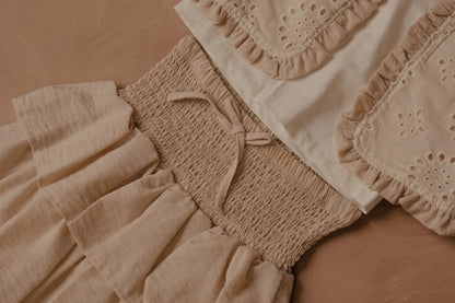 Licci beige smocked pants with ruffled bib and eyelet top details