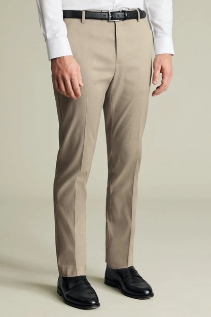 Men's neutral dress trousers, front view with waistband, belt loops, and pleat