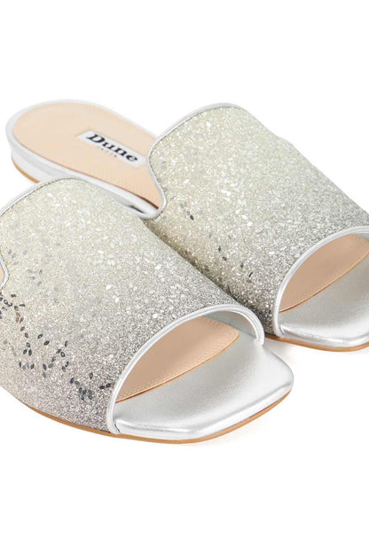 Dune London pewter glitter mule slide with open toe and low flat sole