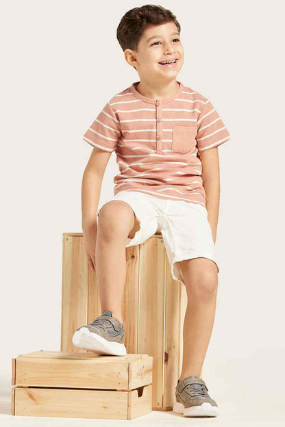 Children's pink-and-white striped T-shirt and white shorts, full-body